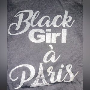 Black girl in Paris hoodie . Normal wear and tear in high traffic areas